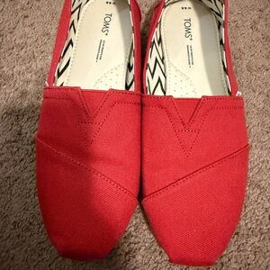 Toms Red Canvas Slip-On Pair with Blue Logo Tabs